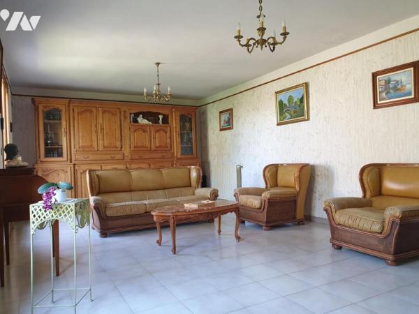 Maison d'habitation de plain pied avec garage sur terrain de 560m2