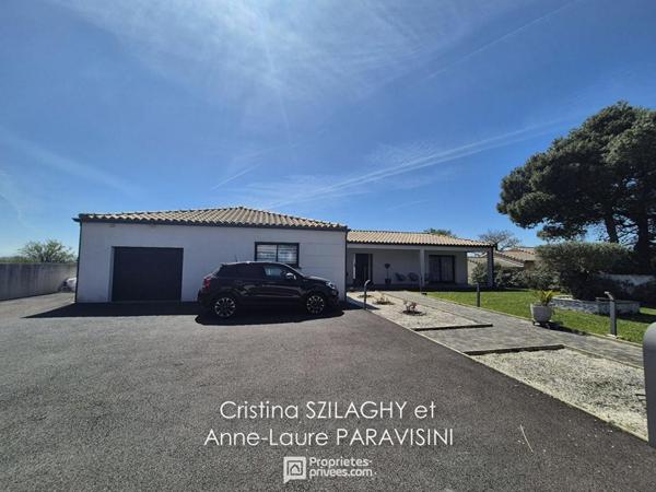 Grande maison de plain-pied avec garage et piscine