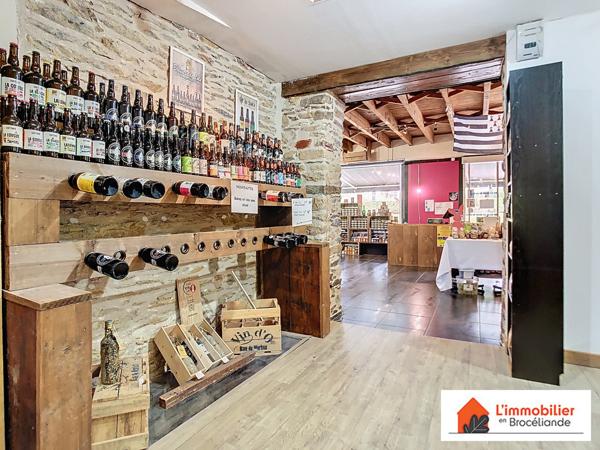 Murs Commerciaux + 2 Logements Neufs – Emplacement Stratégique