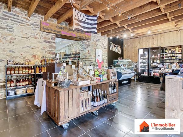 Murs Commerciaux + 2 Logements Neufs – Emplacement Stratégique