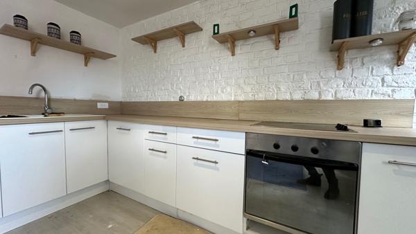 Maison de ville mitoyenne avec garage