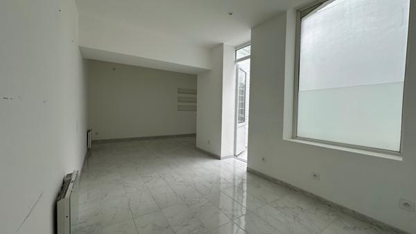 Maison de ville mitoyenne avec garage