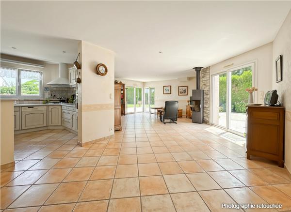 Maison de plain-pied avec jardin paysagé de 1 000 m² et terrasse exposée sud