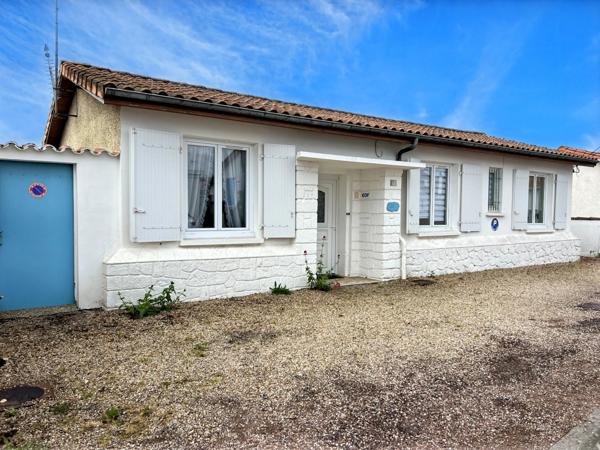 A VENDRE ROYAN MAISON DE PLAIN PIED Quatres chambres avec garage et atelier.