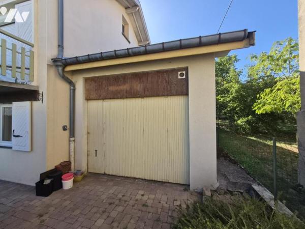 MAISON INDIVIDUELLE T6 AVEC GARAGE ET TERRAIN 