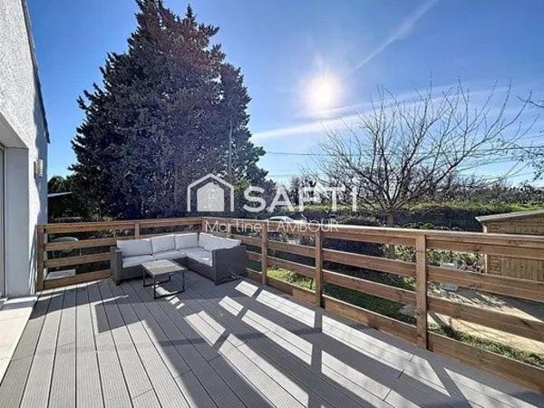 Maison T5 avec terrasse et jardin de 400 m²