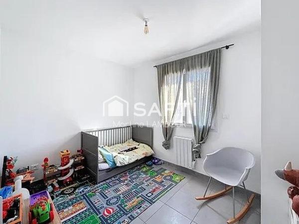 Maison T5 avec terrasse et jardin de 400 m²