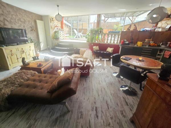 Superbe appartement atypique de 116 m² avec exceptionnelle terrasse de 52 m² plein sud