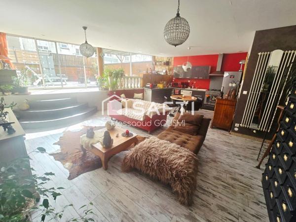 Superbe appartement atypique de 116 m² avec exceptionnelle terrasse de 52 m² plein sud