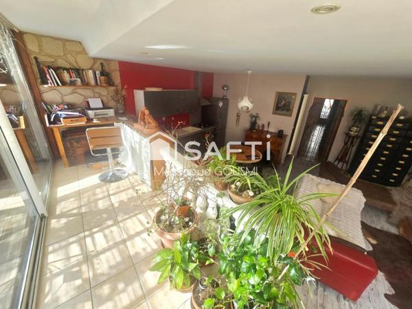 Superbe appartement atypique de 116 m² avec exceptionnelle terrasse de 52 m² plein sud