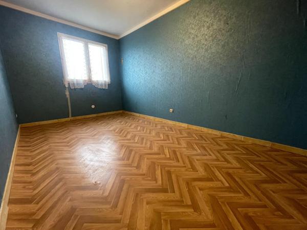 Maison de plain-pied avec garage et véranda