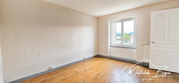 Une maison à réinventer avec joli potentiel
