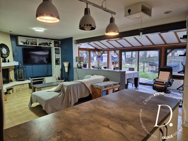 SEJOUR AVEC VERANDA ET CUISINE AMERICAINE 50 M²