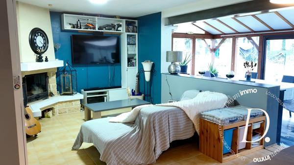SEJOUR AVEC VERANDA ET CUISINE AMERICAINE 50 M²