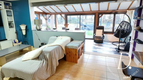 SEJOUR AVEC VERANDA ET CUISINE AMERICAINE 50 M²
