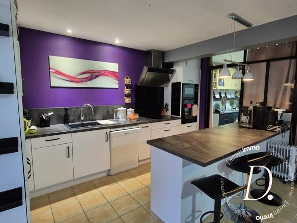 SEJOUR AVEC VERANDA ET CUISINE AMERICAINE 50 M²