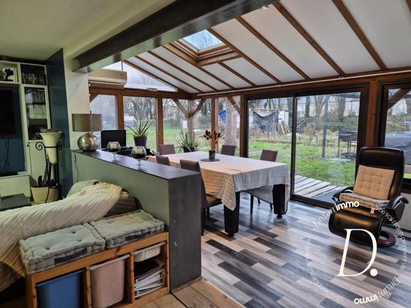 SEJOUR AVEC VERANDA ET CUISINE AMERICAINE 50 M²