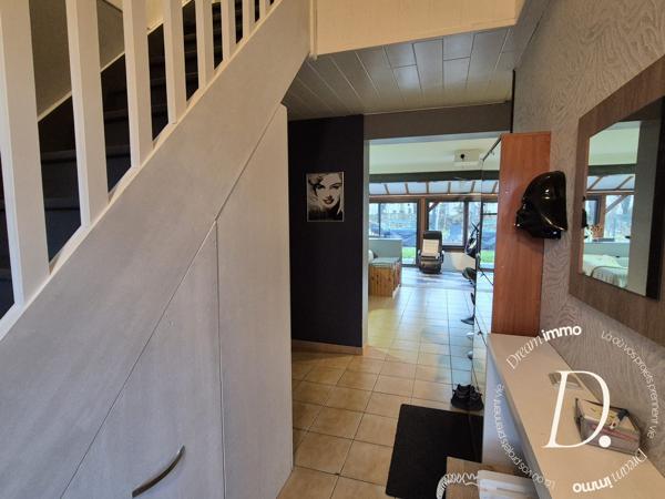 SEJOUR AVEC VERANDA ET CUISINE AMERICAINE 50 M²