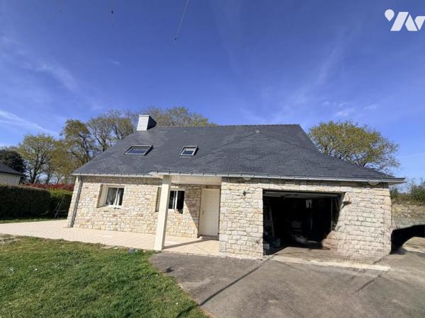 Maison d'habitation construite sur 2 niveaux 4 chambres garage