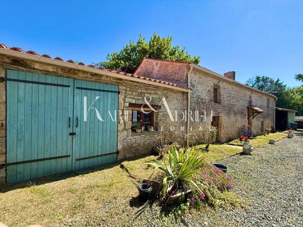 BEL ENSEMBLE IMMOBILIER OFFRANT DEUX MAISONS