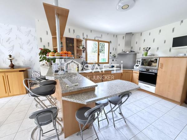 Maison avec une vie de plain?pied et un garage de 30m².