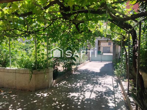 Saint-Ruf : Maison spacieuse, jardin, garage, cour