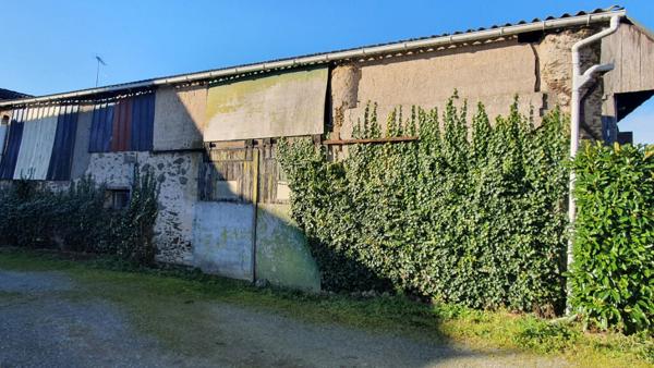 Ensemble immobilier avec terrain constructible et dépendances