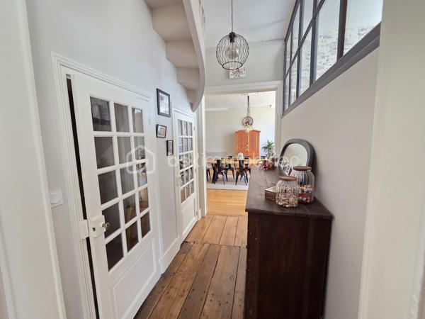 Magnifique Appartement de prestige de 204m² en hyper centre ville de Nevers

Amoureux des biens de caractère, situé au cœur d'un quartier historique du centre ville de Nevers, proche de tous les commerces, écoles et commodités, nous vous présentons ce magnifique appartement de prestige de type T5 dans une résidence sécurisée sans ascenseur, d'une surface habitable Loi Carrez de 204m², appartement 5 pièces  qui comporte une grande entrée indépendante, un grand séjour, une cuisine indépendante aménagée et équipée, un grand salon avec cheminée, une chambre avec placards dressings, un wc indépendant, une salle d'eau au premier niveau, ainsi qu'un palier qui dessert une salle d'eau un wc indépendant, deux chambres dont une avec espace dressing à l'étage, appartement agrémenté d'une cave et d'un grenier aménageable.  

Cet appartement dispose d'un hall d'entrée privatif qui propose un bel escalier en pierres agrémenté de belles rampes en fers forgés. Il dispose d'une grande entrée de 15m², entrée qui plonge sur un immense séjour de 46m²plein de cachet avec ces moulures au plafond et son parquet chêne authentique, séjour dont les grandes fenêtres donnent une belle luminosité. Le séjour donne sur une cuisine aménagée et équipée, et dessert également un dégagement de couloir qui dessert un grand salon de 43m², véritable atout charme avec son beau parquet chêne et son insert de cheminée pour de belles soirées au coin du feu. Le salon donne sur la première chambre de cet appartement, d'une superficie de 21m² qui communique avec la salle d'eau de 8m².
L'entrée principale distribue également un wc indépendant, ainsi qu'un dégagement de couloir qui propose l'escalier qui mène au second niveau de ce duplex.
Le palier distribue une salle d'eau de 7m², un wc indépendant, une chambre de 12m², ainsi qu'une seconde chambre de 22,5m² aménagée en bureau, qui dispose d'un espace dressing de 4m².
Le palier propose également un accès au troisième niveau, niveau de grenier aménageable avec une belle hauteur sous plafond.
Côté pratique, le halle d'entrée propose une petite cave.

Tous les sols de cet appartement sont en parquet chêne authentique (dégagement, salon, séjour, chambre, palier chambre à l'étage), en jonc de mer (seconde chambre de l'étage) en carrelage (salle d'eau et wc du premier niveau), ou en linoléum (entrée, salle d'eau), il bénéficie d'une isolation double vitrage PVC récente pour les huisseries, de volets bois standards, d'un chauffage individuel au gaz avec une chaudière récente (2020).
L'immeuble bénéficie d'une toiture en ardoises naturelles en bon état.
Niveau énergie, ce bien dispose de bonnes notes énergétiques, en D en dépenses énergétiques donc économique et en D en gaz à effet de serre donc peu polluant.
Cet appartement  propose un assainissement collectif.
Côté internet, il dispose de la fibre.
Les charges de copropriété s'élèvent à 1500€/an

Les plus: La qualité générale du bien et son aménagement intérieur, sa proximité avec toutes les écoles, commerces et commodités du centre ville de Nevers , son charme intérieur avec son parquet chêne authentique et ses moulures au plafond, son séjour de 46m², sa cuisine aménagée et équipée, son salon de 40m² avec son insert de cheminée, ses chambres et salle d'eau avec wc sur chaque niveau.
  
Photos supplémentaires disponibles sur BSK IMMOBILIER > Nos conseillers > Olivier FRESLON
Pour tout renseignement complémentaire ou pour une visite, contactez moi au 07.62.78.13.13.

Amoureux des biens de caractère, idéal pour une grande famille ou pour une résidence secondaire, cet appartement est une opportunité rare à saisir, un vrai coup de cœur!!!