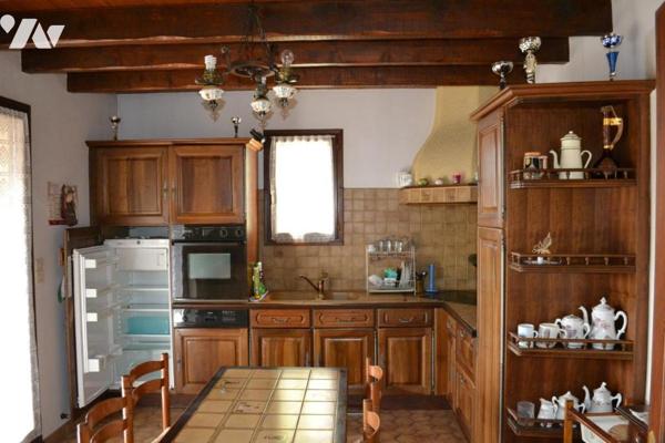 MAISON INDIVIDUELLE AVEC TERRAIN ATTENANT DE 1485 m²