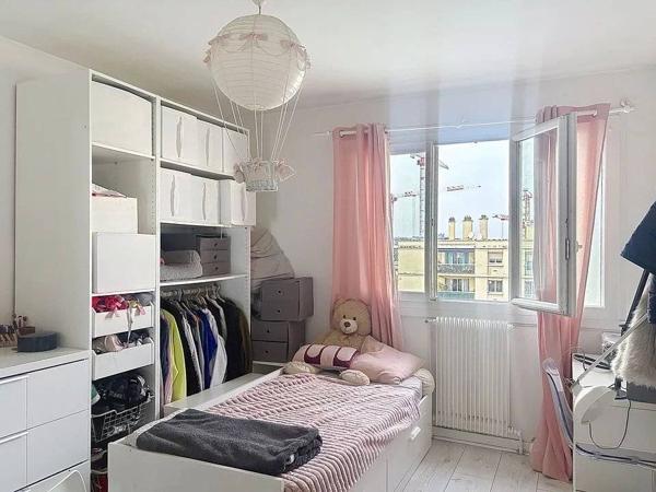 Appartement T4 traversant Est-Ouest avec grand balcon