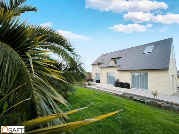 MAISON FAMILLIALE AVEC SES 5 CHAMBRES AVEC SES COMMERCES A PIEDS