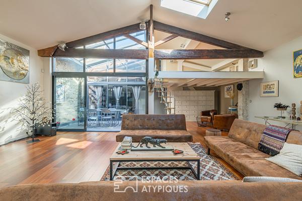 Grand loft lumineux avec terrasse couverte