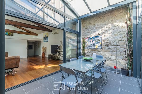 Grand loft lumineux avec terrasse couverte