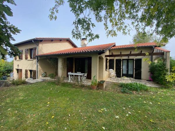 Maison T6 avec garage sur terrain arboré de 2000m2