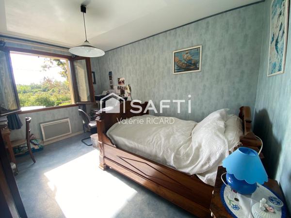 Maison T6 avec garage sur terrain arboré de 2000m2