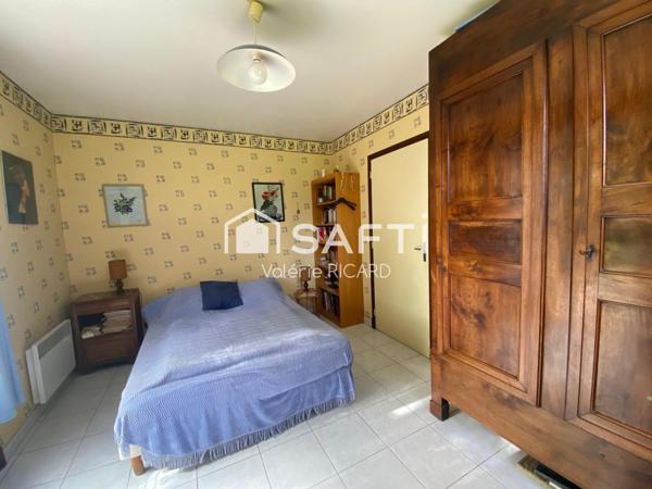 Maison T6 avec garage sur terrain arboré de 2000m2