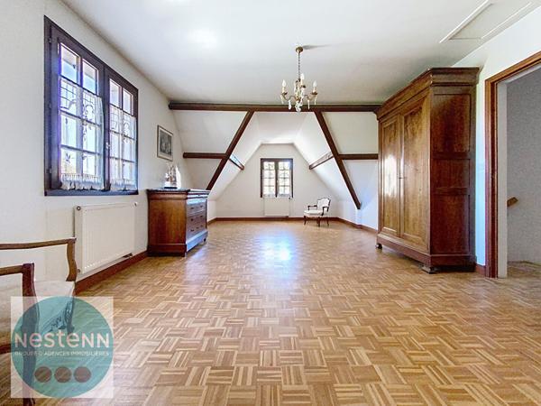 Une maison familiale aux beaux volumes, avec jardin, garage et sous-sol total à Olivet