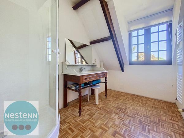 Une maison familiale aux beaux volumes, avec jardin, garage et sous-sol total à Olivet