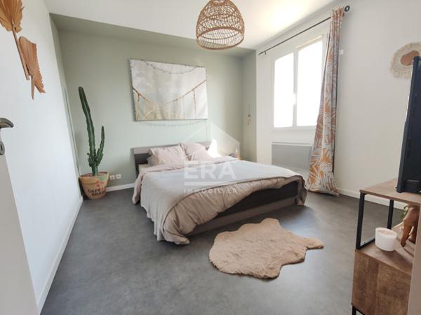 Belle maison de 100m2 avec garage et extérieur.