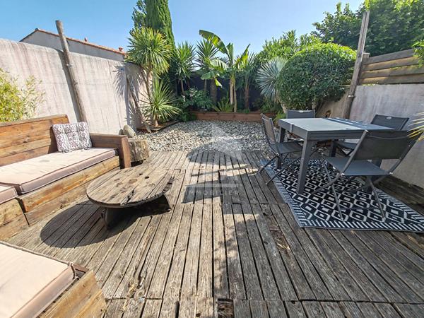 Belle maison de 100m2 avec garage et extérieur.