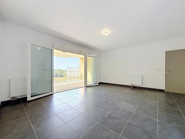 JUVIGNAC (34) Appartement à vendre 3 pièces 65 m2 + Terrasse couverte 17,5 m2 + Parking sécurisé en sous sol