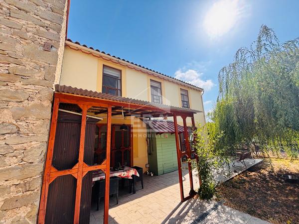 Maison en pierre de 129 m² avec grange, garage et jardin