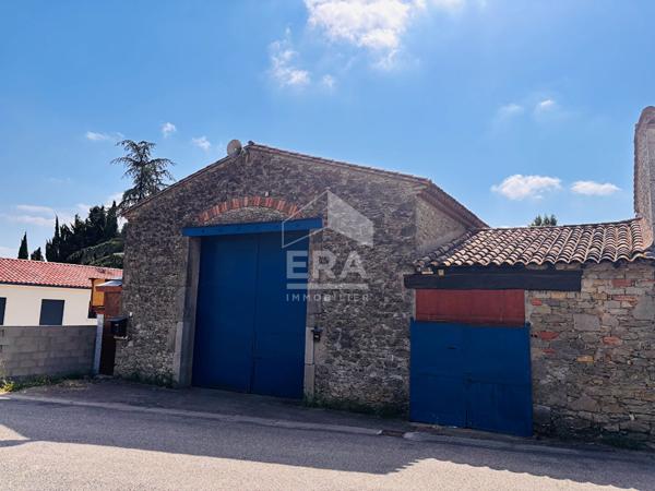 Maison en pierre de 129 m² avec grange, garage et jardin