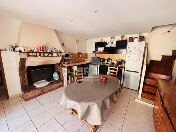 Maison en pierre de 129 m² avec grange, garage et jardin