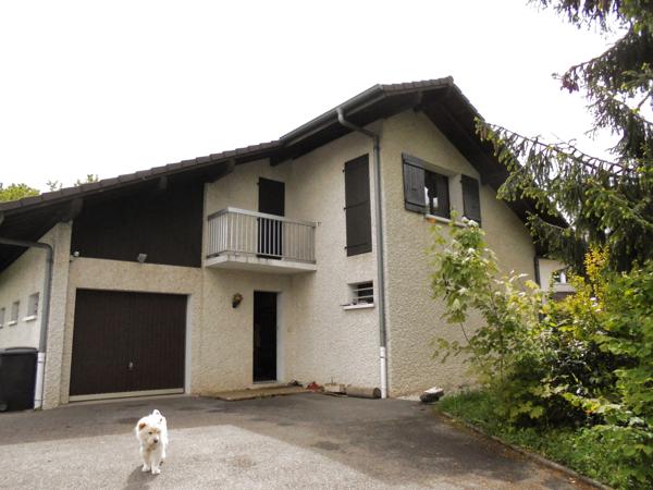 Maison 4 chambres garage et jardin.