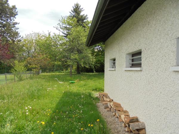 Maison 4 chambres garage et jardin.