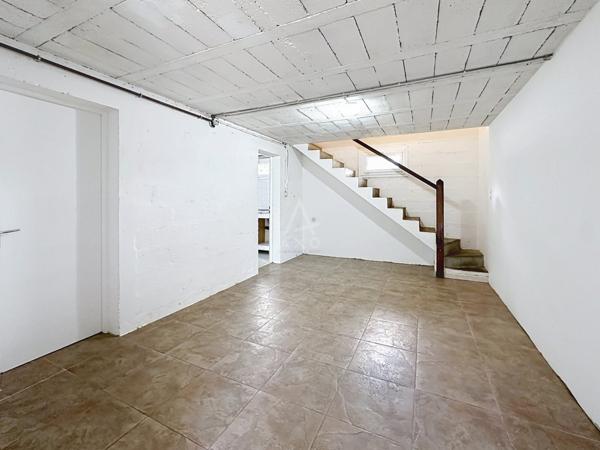 Maison traditionnelle sur deux niveaux d'environ 101 m²