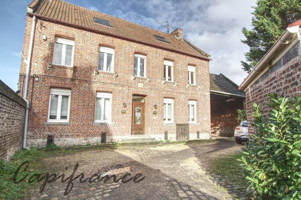 Immeuble à Douai (59), maison individuelle, 148m² , 3 chambres, parking, dépendances et jardin 1400m²!