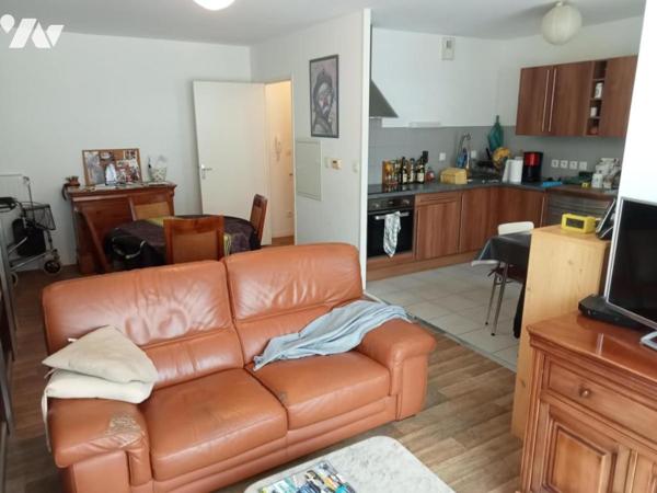 T3 de 67,44m² avec terrasse d'env. 18m², garage et parking 