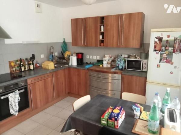 T3 de 67,44m² avec terrasse d'env. 18m², garage et parking 